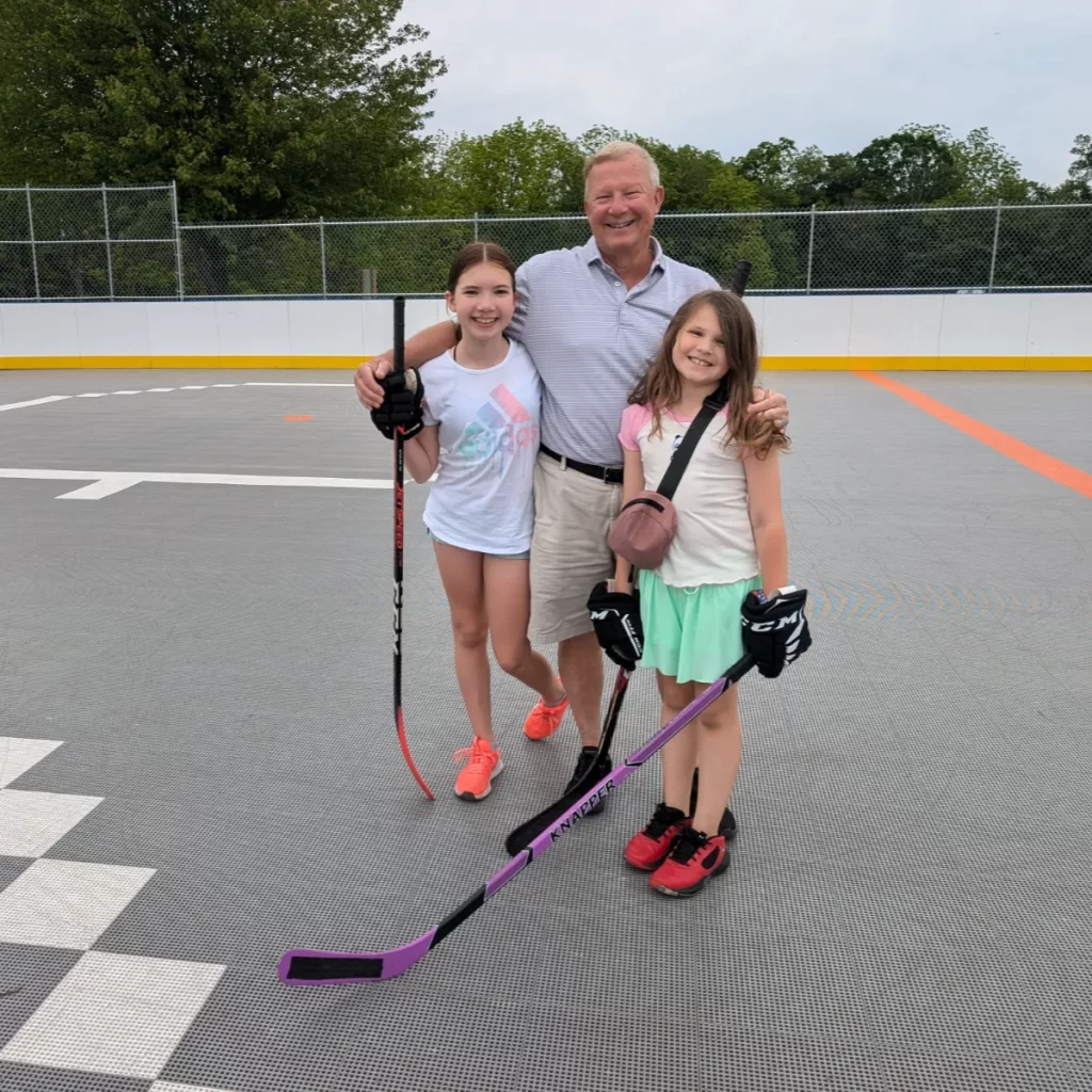 Generations of Hockey - Grandfather and two granddaughters at the rink